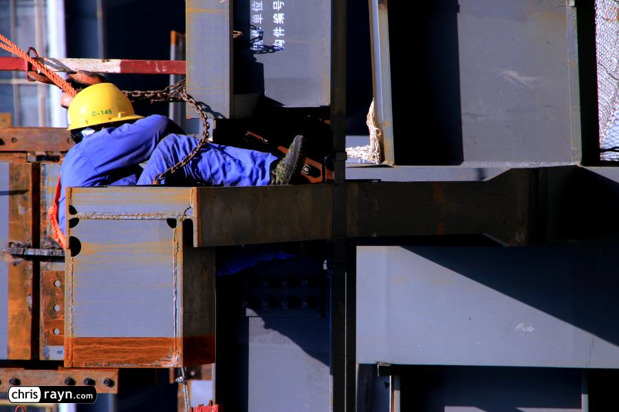 Construction Worker, Caught In Steel Beams And Iron Chains