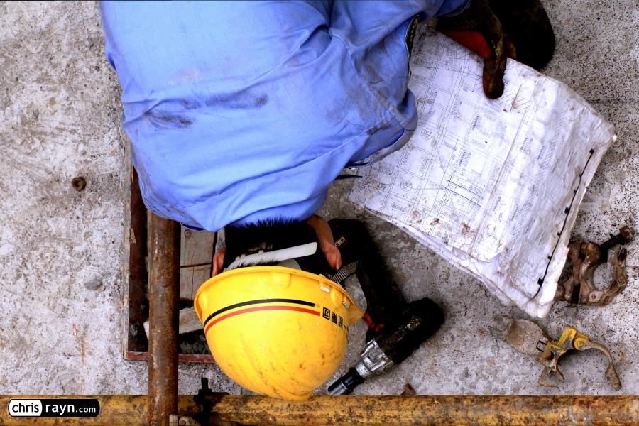 Bird's View of a Construction Worker and His Tools 