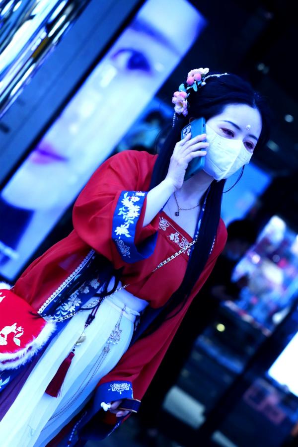 Masked Woman in Traditional Chinese Hanfu Dress in Beijing