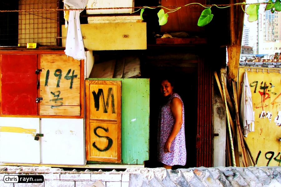 A woman in her Shanghai house marked for relocation