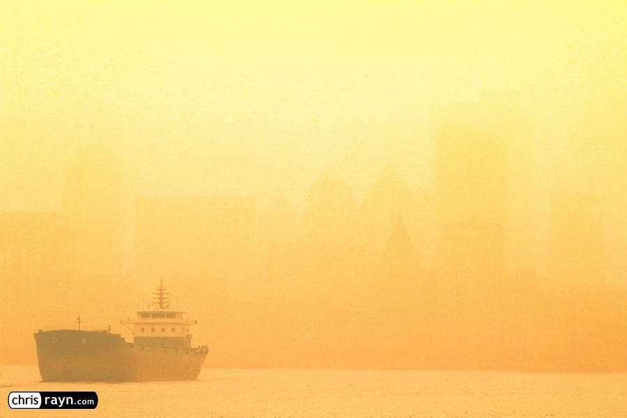 Ship On Shanghai River As Air Pollution Blankets Shore