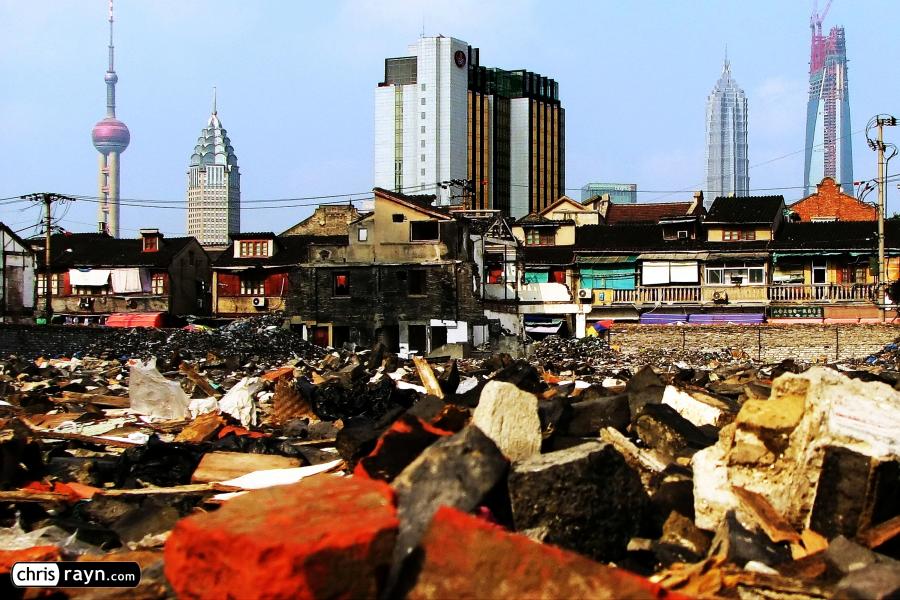 Shanghai's skyline rises from the remains of the old town